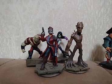 saxda baba səkilləri: Disney Infinity fiqurları kolleksiyası Məzmun: - Toy Story: Woody — 6