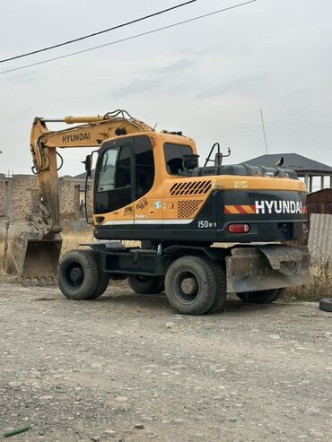 фронтальный погрузщик: Экскаватор, Hyundai, Колесный