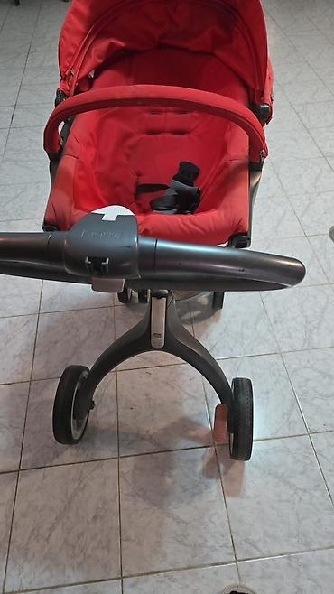 usag maneji: Stokke uşaq arabası satılır. Parlaq qırmızı rəngdə olan bu model — 2