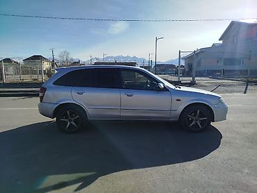 cr v 1 поколение: Mazda 323: 2002 г., 1.6 л, Механика, Бензин, Хэтчбэк — 4