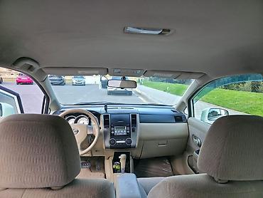 Nissan: Nissan Tiida: 1.5 л | 2011 г. Седан — 6