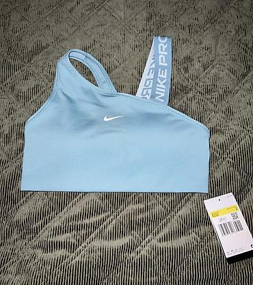 нове: NIKE Pro Swoosh Asymmetrical. Sports Bra vel. S NOVO  — 3