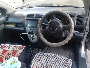 купить запчасти на опель вектра б: Хэтчбек Honda Civic серебристого цвета, представленный на фотографиях