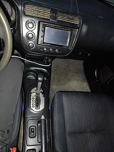 byd 06: Honda Civic: 2004 г., 1.5 л, Автомат, Бензин, Седан — 7