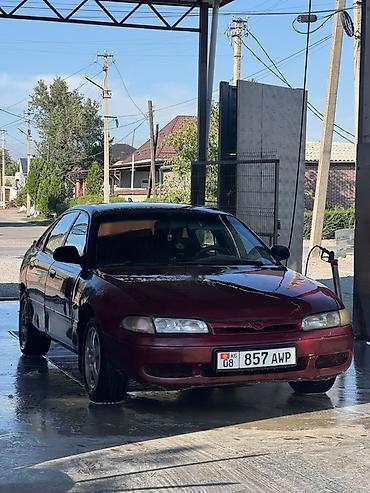 твикис диска: Mazda 626: 1997 г., 2 л, Автомат, Бензин, Седан — 1