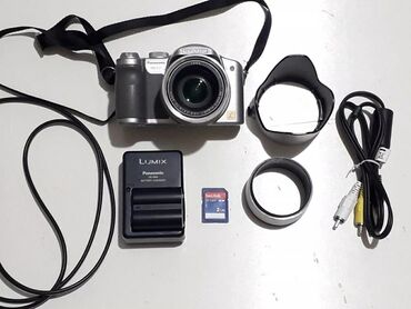 починка фотоаппаратов: Panasonic DMC FZ7, объектив Leica, флешка, зарядное устройство