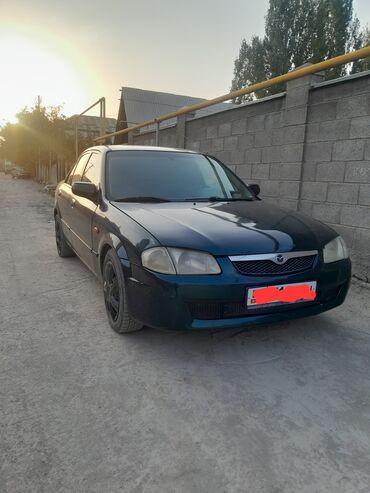 Mazda: Mazda 323: 2000 г., 1.6 л, Механика, Бензин, Седан