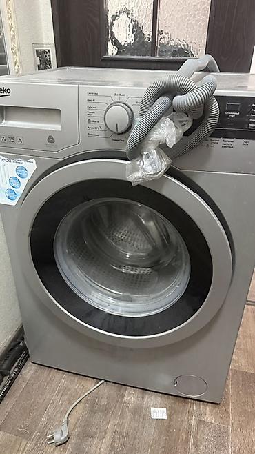 bew e34: Стиральная машина Beko с фронтальной загрузкой, серебристый корпус — 1
