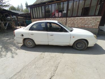 Daewoo: Daewoo Nubira: 1999 г., 1.5 л, Механика, Бензин, Седан