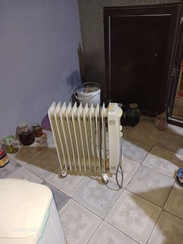 işlənmiş radiyator: Обогреватели и камины