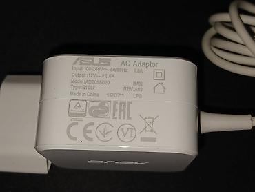 android box: Блок питания ASUS AD2055020, 12V-2A (24W), Размер штекера: 4.0 × 1.35 — 1