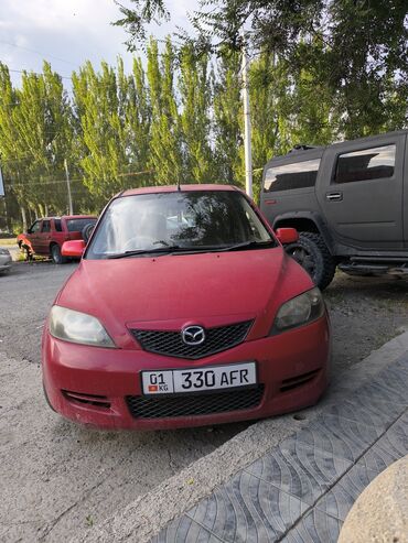 демио: Mazda Demio: 2004 г., 1.3 л, Автомат, Бензин