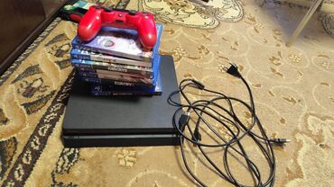 JMC: Playstation 4 slim 1TB. Ela veziyyetdedir. Hec bir problemi yoxdu