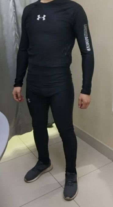 мужская спортивная одежда: Мужское Термобельё Under Armour предназначенно для занятий спортом и