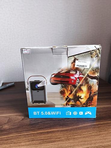 Proyektorlar: Portativ Proyektor – BT 5.0 & Wi‑Fi Əsas xüsusiyyətlər: - Ev — 7