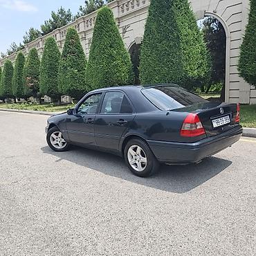 cls 63 amg: Mercedes-Benz C-Class: 2.3 l | 1996 il Sedan — 4
