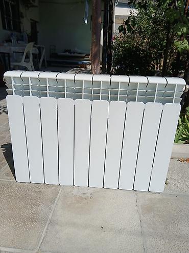 seksiyali radiator: 6 senksiyalı ataplena satılır. Arxadakıdı. Qiyməti 45 manat. Ünvan — 1