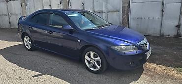 cx 9: Mazda 6: 2002 г., 2.3 л, Механика, Бензин, Лифтбек — 3