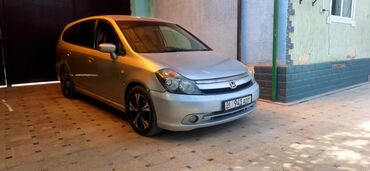 авто под выкуп без первоначального взноса бишкек: Минивэн Honda Stream серебристого цвета, представленный на