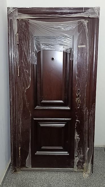 Mənzil üçün İşlənmiş Giriş qapısı Zəmanətsiz, Ünvandan götürmə