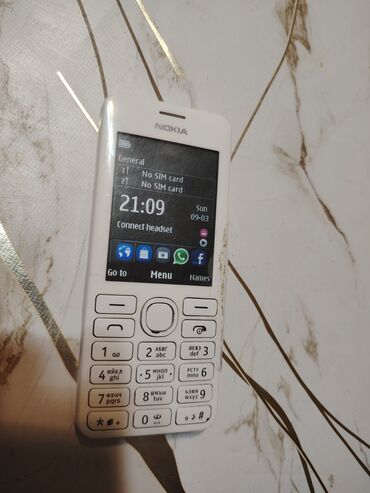 s22 telefon: Nokia 1, 2 GB, rəng - Ağ, Düyməli, İki sim kartlı