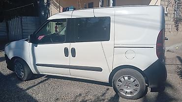 фольксваген тигуан л с: Fiat Doblo Cargo furgonetka - Kuzov: ağ rəng, 2 yan sürüşkən qapı — 2
