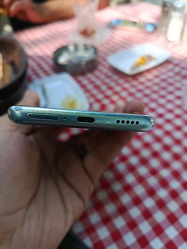 xiaomi redmi 9 t: Redmi Note 14 Pro+, 512 GB, rəng - Yaşıl, Sensor, Barmaq izi, Simsiz şarj — 9