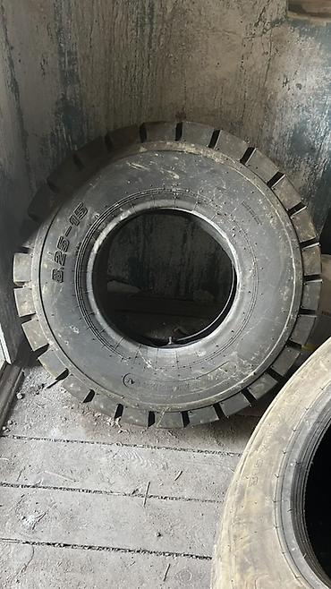 Шина 8.25‑15 для спецтехники - Размер: 8.25‑15 (указан на борте). -