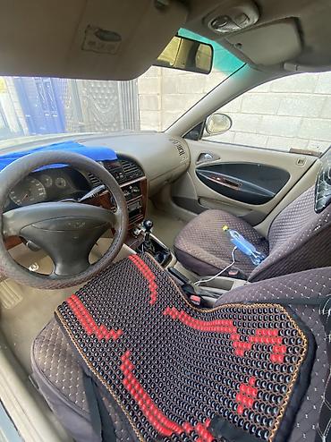 чехлы на х: Daewoo Nubira: 1999 г., Бензин, Седан — 5