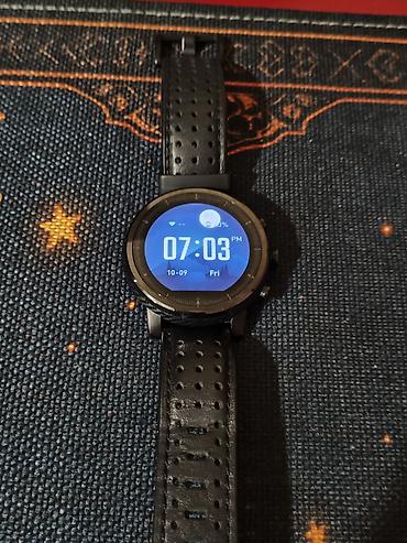 smart telefonlar: Xiaomi Amazfit stratos, uzerinde silikon kemer, zaryatkasi verilir — 1