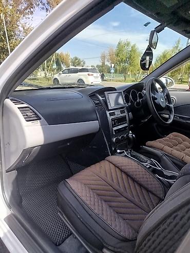 bid машина: Nissan Wingroad: 2004 г., Автомат, Бензин, Универсал — 7