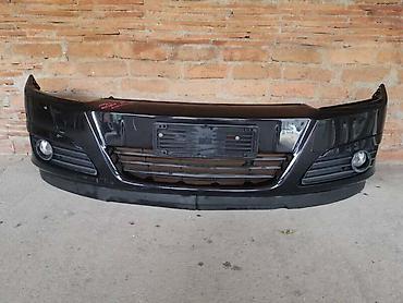 servis abs: PREDNJI BRANIK (BOJA CRNA) ZA OPEL ASTRA H OD 2004. DO 2009. GOD. | — 2