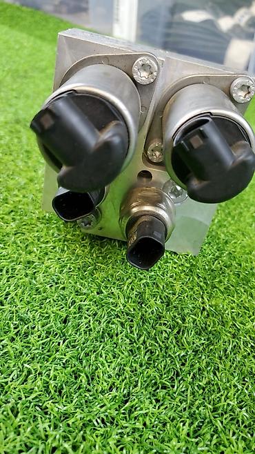 Другие автозапчасти: Блок клапанов гидроподвески (Dynamik Drive) для БМВ X5 Е70 ​6782—737 — 5