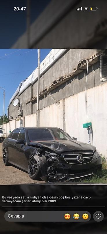 mersedes saat: Mercedes-Benz E-Class, 2009 il. Sedan, qara rəng. AMG üslublu xarici — 1