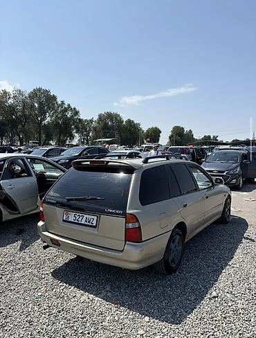 дириф кар: Mitsubishi Lancer: 1995 г., Механика, Бензин, Универсал — 2