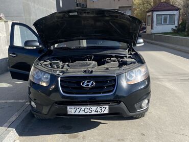 Hyundai: Hyundai Santa Fe – qara rəngli, şəhər və uzun yol üçün tam ölçülü SUV — 2
