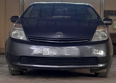 Toyota: Toyota Prius (2-ci nəsil) – hibrid hetçbek Xüsusiyyətlər: - Gümüş-boz — 5