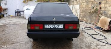 Tofas: Tofaş Şahin sedan – qara rəng, 4 qapı, arxa ötürücülü. Xüsusiyyətlər — 10