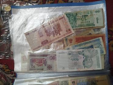 Монеты: Коллекция монет и банкнот России Состав: - Альбом «Памятные монеты — 25