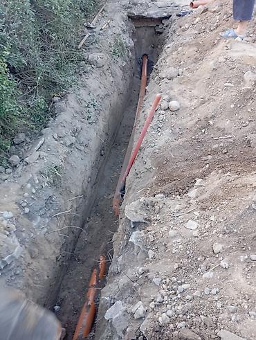 кладка забора: Монтаж наружной канализации и водоснабжения под ключ - Земляные — 7