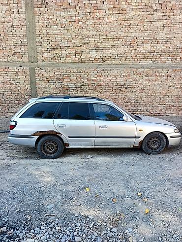 зил газ метан: Mazda 626: 1999 г., 1.8 л, Механика, Бензин, Универсал — 3