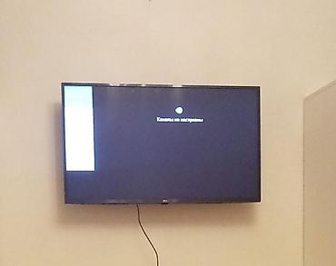 тв бокс в баку: LG markalı düz ekran televizor. Divara quraşdırılmış böyük ekranlı — 1
