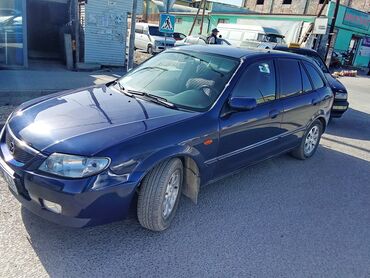 mitsubishi lancer машина: Mazda 323: 2001 г., 1.6 л, Механика, Бензин