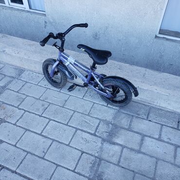 детский товар: Продаю велосипед 1500сом колёса 12 состояние как на фотографии