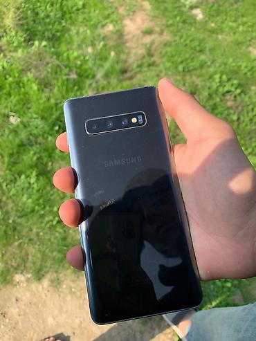 a 20 s: Samsung Galaxy S10 Plus, 128 GB, rəng - Qara, Simsiz şarj — 1