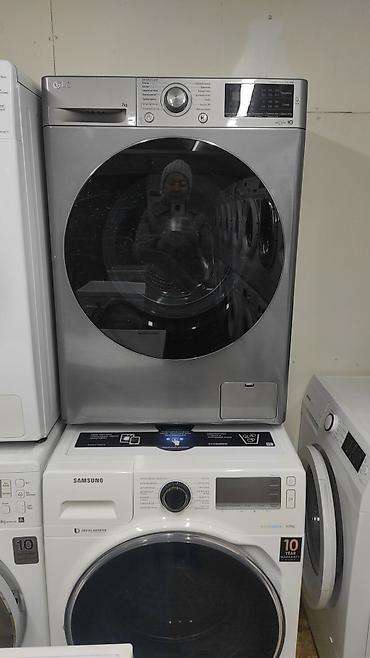 Стиральная машина LG, фронтальная загрузка, серебристый корпус