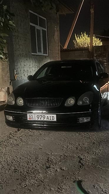 byd e1: Sedan бизнес‑класса черного цвета. Кузов — классический четырехдверный — 1