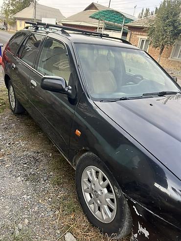 Транспорт: Nissan Primera: 2000 г., 2 л, Механика, Бензин, Универсал — 3