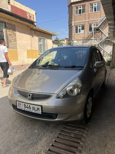 тико машина 2020 цена: Хэтчбек Honda Fit в золотистом цвете, оснащенный противотуманными