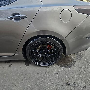 kia optima spoyler: Kia Optima Turbo – sedan Xüsusiyyətlər: - Turbo benzin mühərriki — 2
